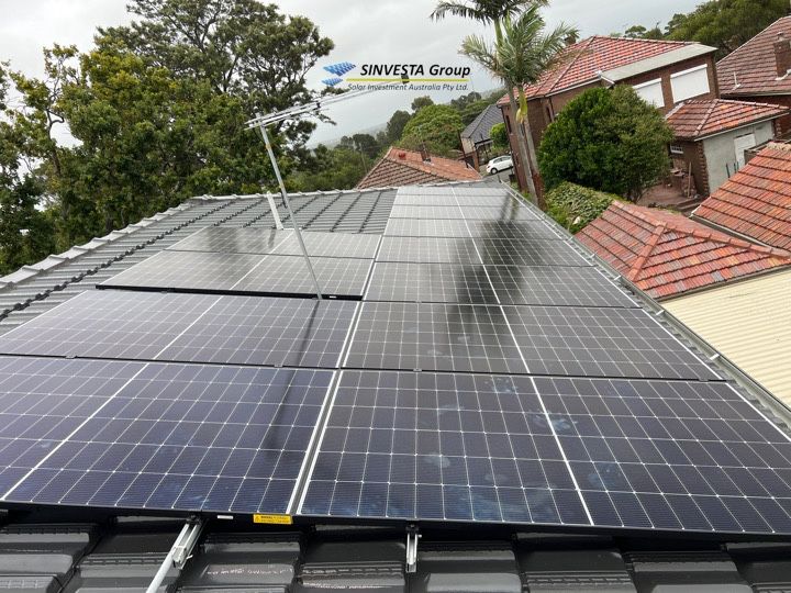 Solar array across a tiled residential roof.